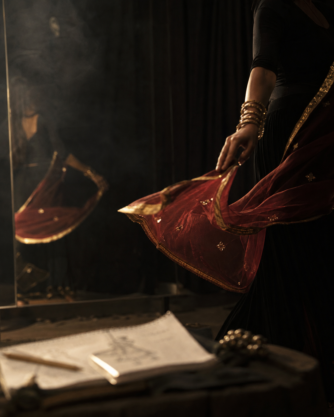 Hand and fabric in rehearsal — cinematic detail